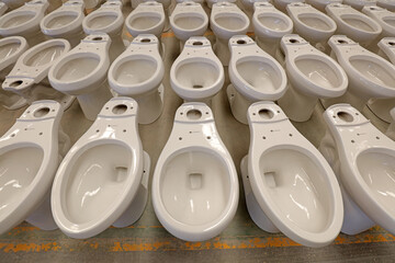 Semi-finished ceramic toilets are in the factory