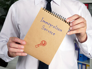  Motivational concept meaning Immigration Service k with phrase on the piece of paper.