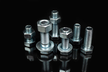 a few bolts and nuts made of silver metal