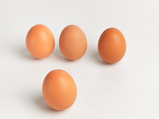 A bunch of chicken eggs isolated on white background.