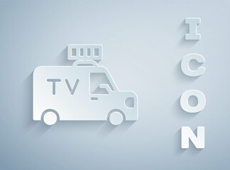 Paper cut TV News car with equipment on the roof icon isolated on grey background. Paper art style. Vector.