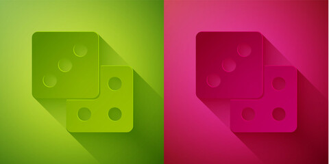 Paper cut Game dice icon isolated on green and pink background. Casino gambling. Paper art style. Vector.