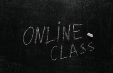Fototapeta premium Online class words chalk hand drawn on blackboard