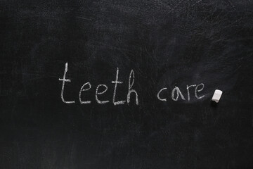 Words teeth care chalk hand drawn on blackboard