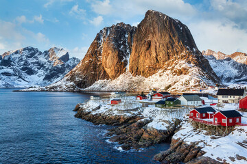 Hamnoy , Lofoten, Norway. Fisherman's Village with snow and red houses