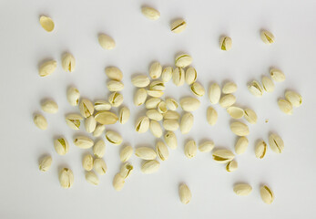 Pistachios isolated on white background, top view. 