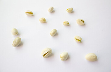 Pistachios isolated on white background, top view. 