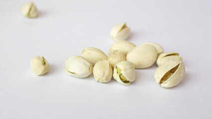 Pile of Pistachios isolated on white background. 