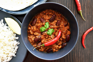 Chilli con carne on a black bowl.  Italian food.