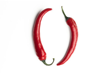 2 red hot chili peppers on a clean white background
