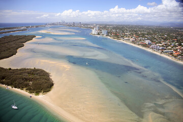 Fototapeta na wymiar Aerial of Gold Coast Broadwater showing sand-bars, boats and Surfers Paradise skyline