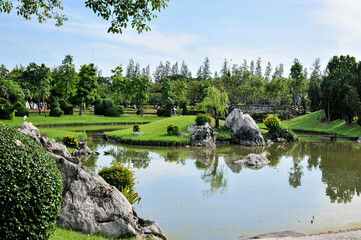 Fototapeta na wymiar landscape view of the lake in the garden at King Rama 9 Park ing Bangkok Thailand