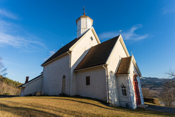 Fototapeta premium medieval stone church at toten, norway