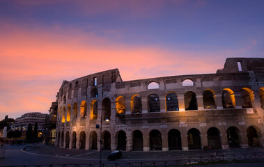 The Colosseum with sunset scene and  the night at Rome, Italy. which  the architecture and landmark. Rome Colosseum is one of the main attractions of Rome in Italy