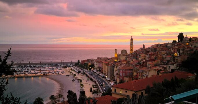 Timelapse Of A Beautiful Sunset Over The Old Town Of Menton And The Mediterranean Sea On The French Riviera, Europe - DCi 4K Resolution
