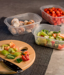 Frozen vegetables. Mushrooms, peppers, tomatoes. Cooking process.