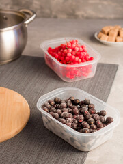 Frozen berries. Red berries. Kalina. Black currant. Cooking process. Home preparations for the winter.