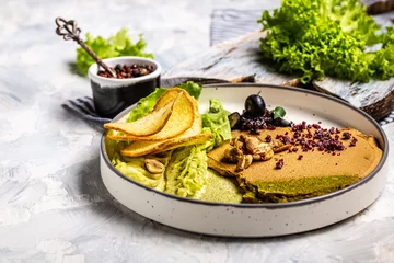 Fototapeten Pate. Bowl of homemade liver pate on white background, top view. Chicken liver pate with bread © Надія Коваль