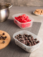 Frozen berries. Red berries. Kalina. Black currant. Cooking process. Home preparations for the winter.