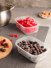 Frozen berries. Red berries. Kalina. Black currant. Cooking process. Home preparations for the winter.