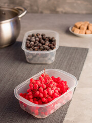 Frozen berries. Red berries. Kalina. Black currant. Cooking process. Home preparations for the winter.