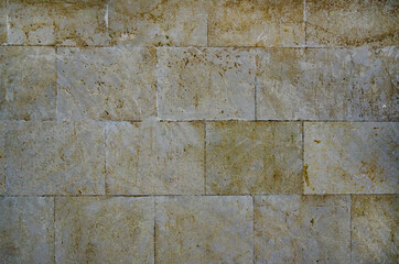 Texture of yellow stone bricks.
