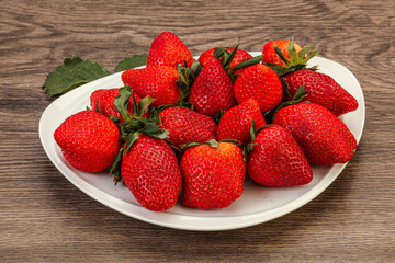 Ripe sweet strawberry with leaf