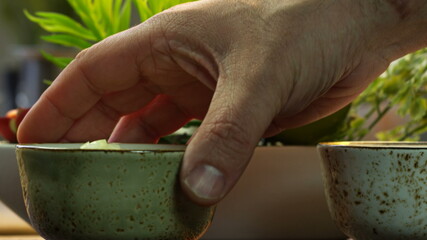 Adding Pepper. Close-Up Food. Cooking Process. Chef Cooking Dish. Chef Preparing Food photo still.