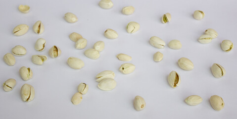 Pistachios isolated on white background, top view. 