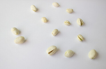 Pistachios isolated on white background, top view. 