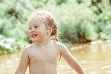 child playing in the river