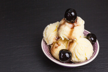 fresh amarena ice cream scoops with cherry - 401765943
