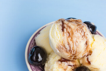 fresh amarena ice cream scoops with cherry