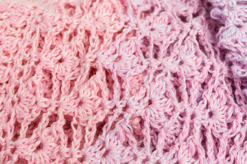 handmade multicolor crochet background in pink and lilac with double crochet stitches
