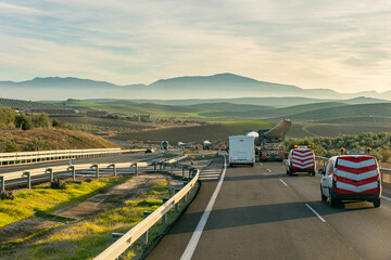 Special transport of wind turbine blades. Several trucks with wind turbine blades circulating on...