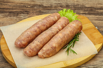 Raw pork meat sausages for grill