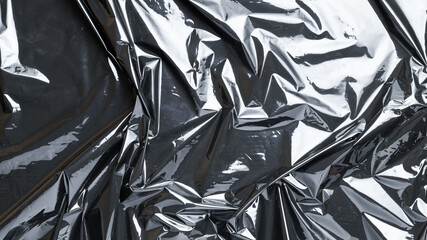 Plastic bag texture. Wrap transparent dark cellophane background. Black shiny film pattern for...