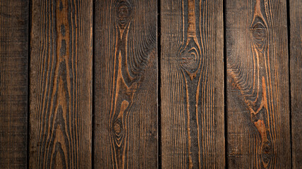 wooden background of brown color from vertical planks