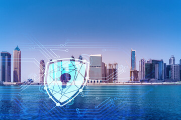 Skyscrapers of Dubai business downtown. International hub of trading and financial services. Lock...