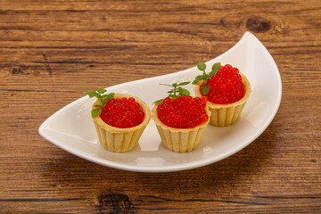 Apetizer - tartlet with red caviar