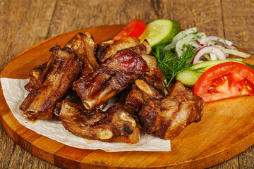 Grilled pork ribs barbeque with vegetables