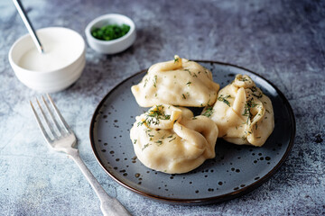 Steamed manta rays with meat sprinkled with dill in a plate