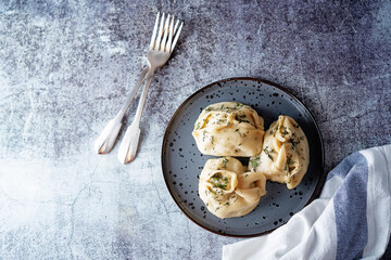 Steamed manta rays with meat sprinkled with dill in a plate