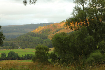 A view down from the hills of Scotland to the glens, rivers and lochs below