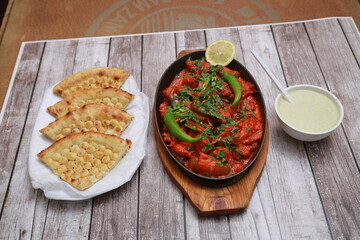 chilly chicken 65 sixty five wit bread and vegetable salad 