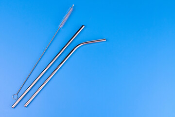 Reusable Stainless Steel Straws Cleaning Brush Light Blue Background Eco Lifestyle Concept Copy Space