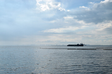 Offshore construction vessel anchored far from sea shore