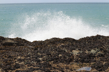 Stormy waves crashing against the Lansallos rocks