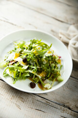 Arugula celery salad with raisins