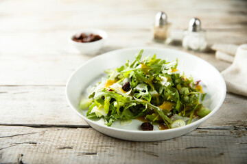 Arugula celery salad with raisins
